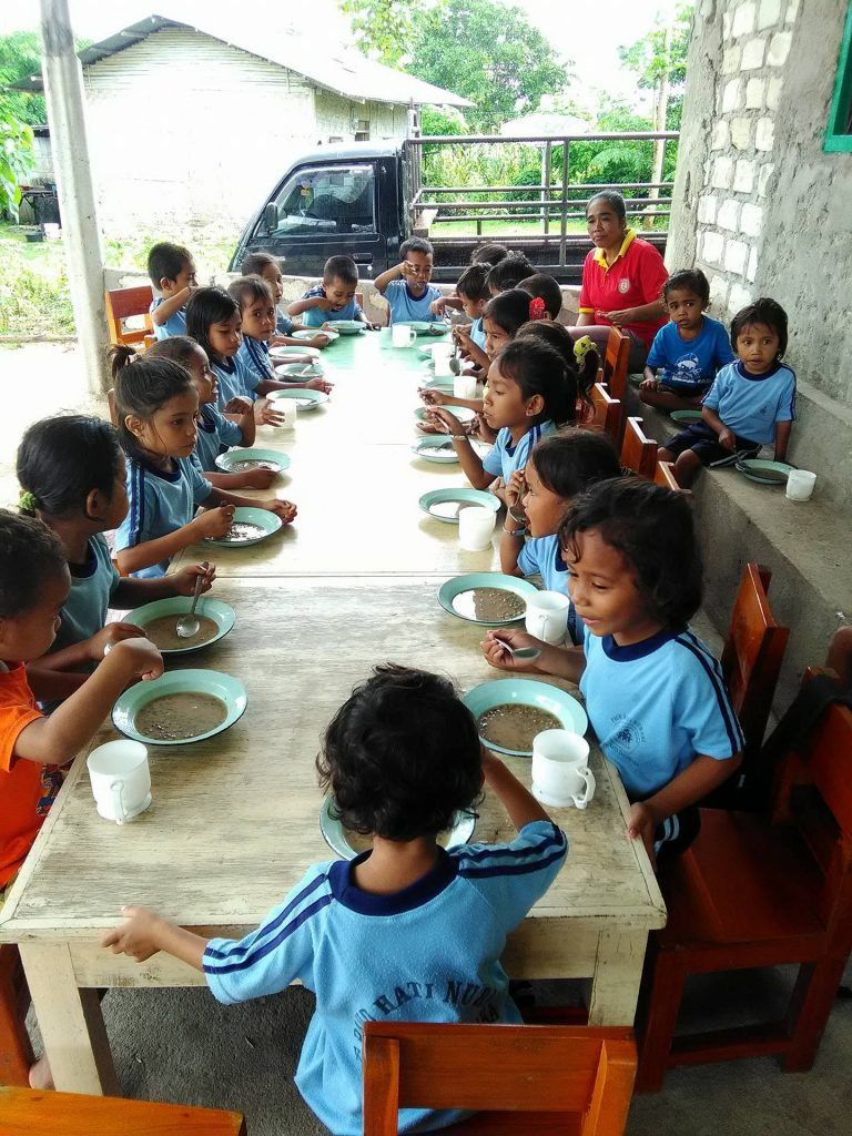 Eating together at the Hati Nurani Orphanage in Sumba, Indonesia